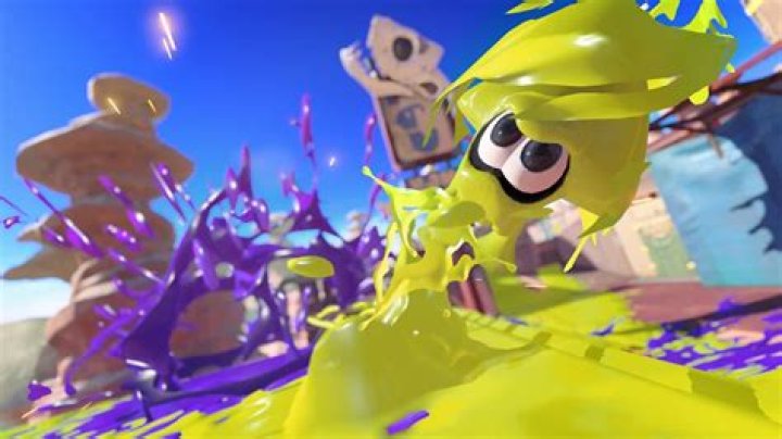 Splatoon 3 squid firing Tristrike launcher during a heated game of Turf War