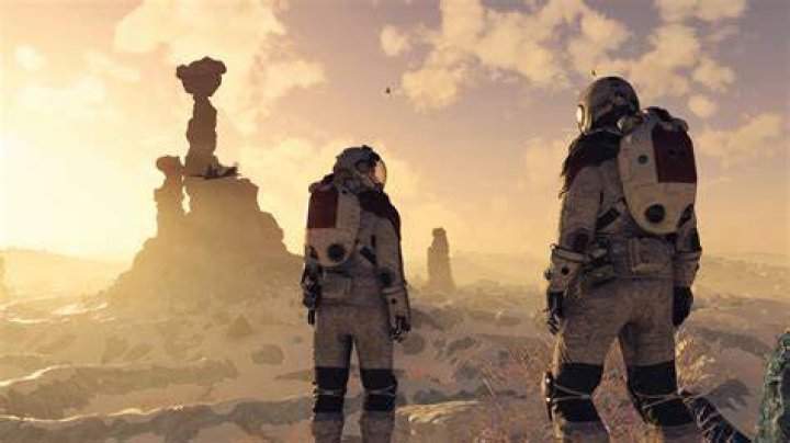 Starfield: an astronaut stood close to a spaceship in New Atlantis.